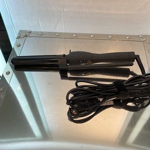 Varies Marcel Curling Iron